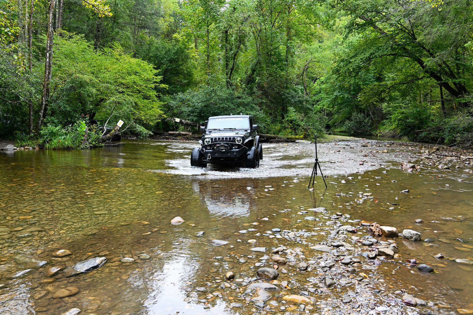 Jeep working the creek crossing
