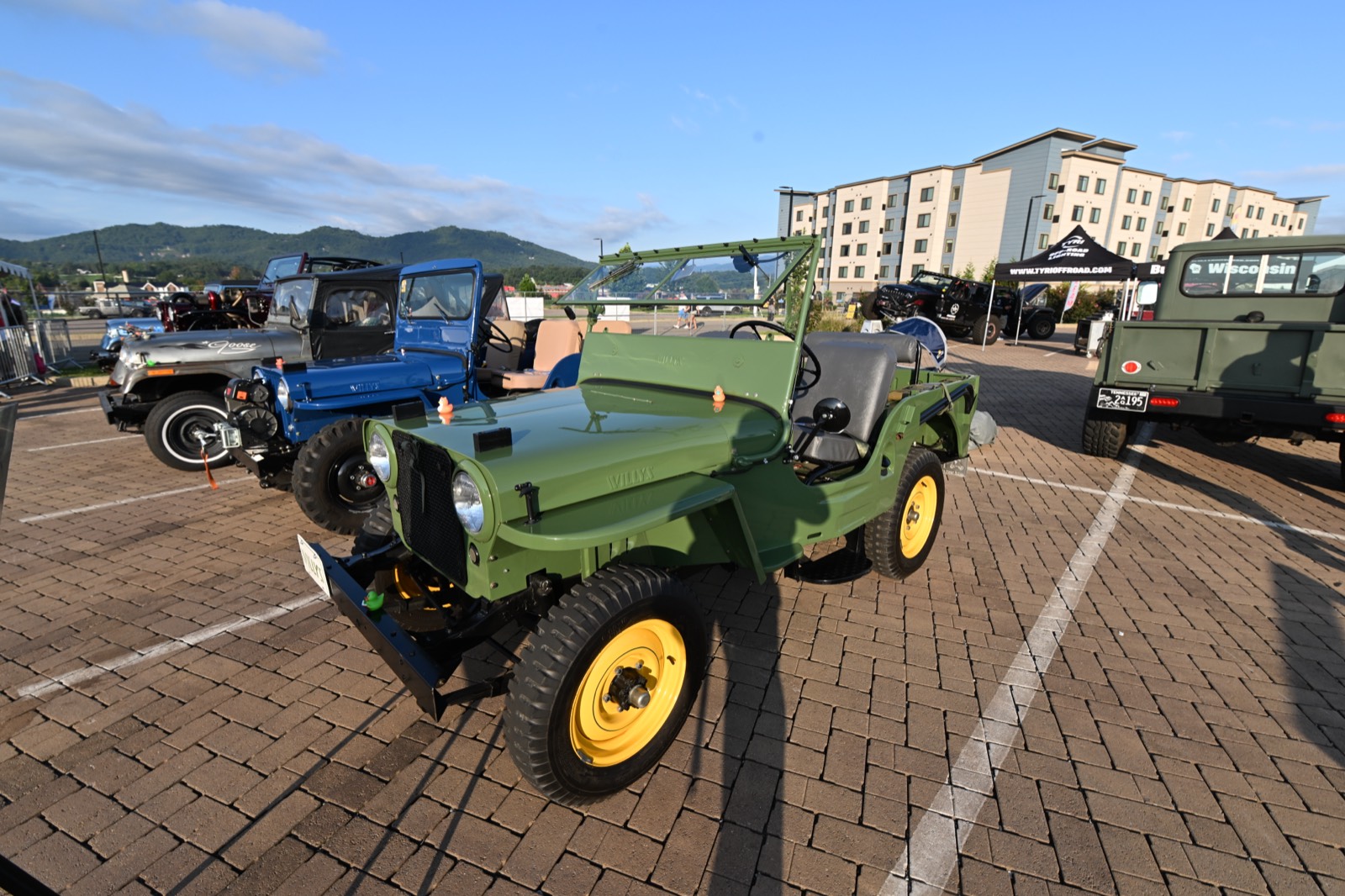 Classic Jeeps on the brick lot at the Invasion