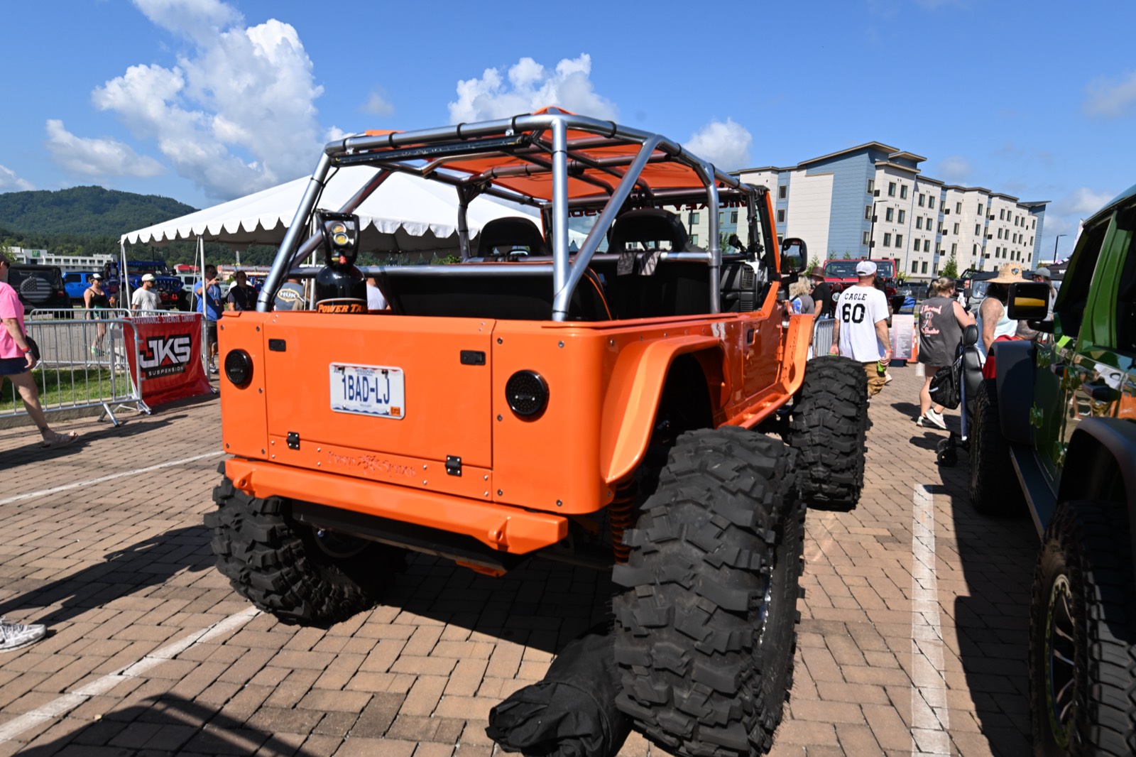 Orange LJ build on the outdoor show lot