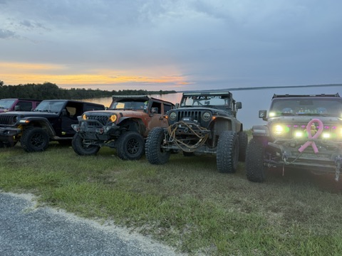 Jeep lineup at sunset for Jeepin’ for a Cure